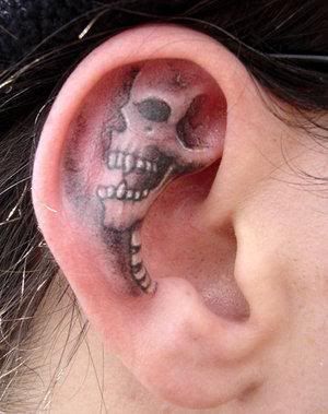 skull ear tattoo 106