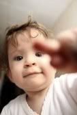 7127629-playful-curious-interesting-baby-touching-finger-you.jpg