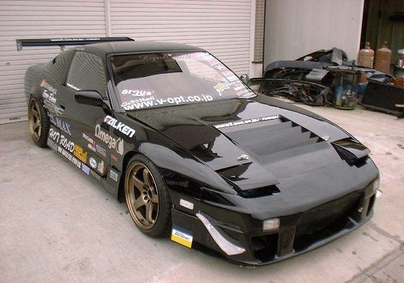 http://i190.photobucket.com/albums/z242/deadpirateproductions2/180SX-Koguchi180Black-2.jpg