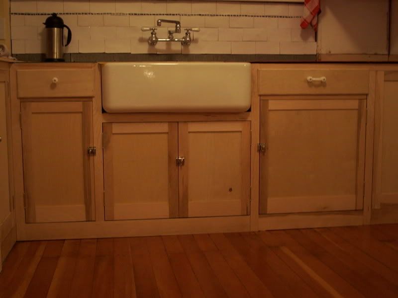 Scribing around farm sink front base +...caulk? Putty?