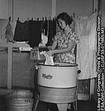 woman in the 1920s doing laundry